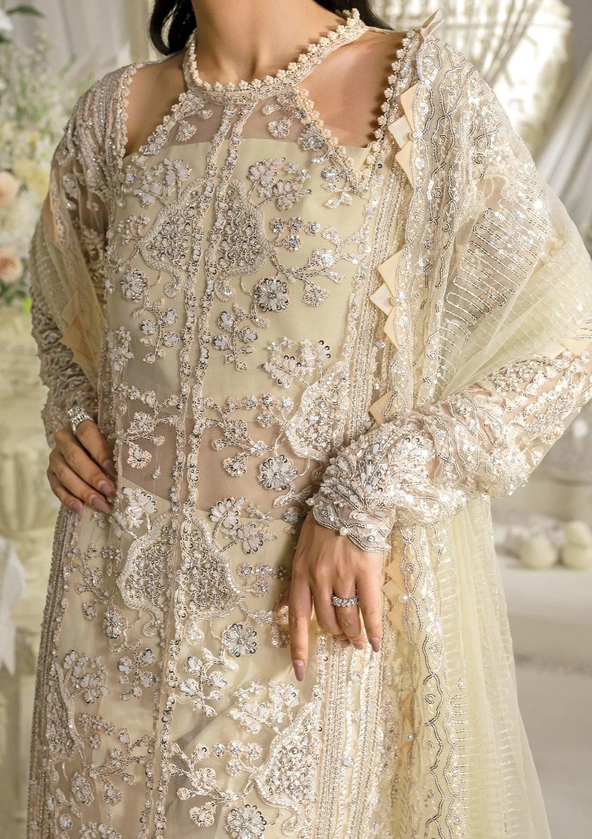 Elaf Evara Aura luxury formal dress in ivory with embroidered hand-embellished front and dupatta, 2024 collection.