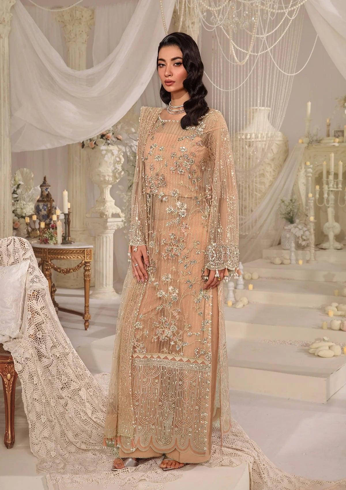 Elegant Peach ZYVA luxury dress from ELAF Evara Collection, complete with embroidered poly net front and dupatta, highlighting sophistication and style.