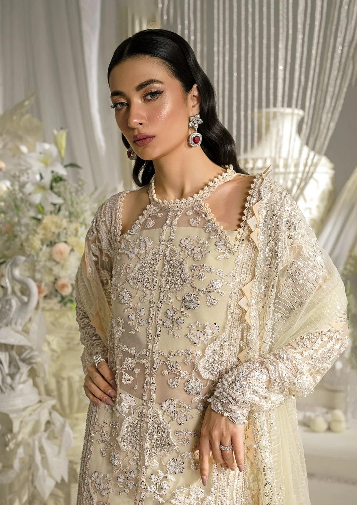 Elaf Evara Aura luxury formal dress in ivory with embroidered hand-embellished front and dupatta, 2024 collection.