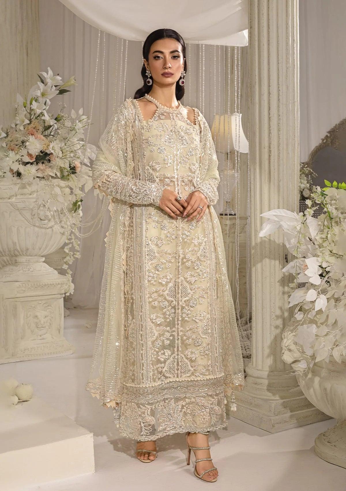 Elaf Evara Aura luxury formal dress in ivory with embroidered hand-embellished front and dupatta, 2024 collection.