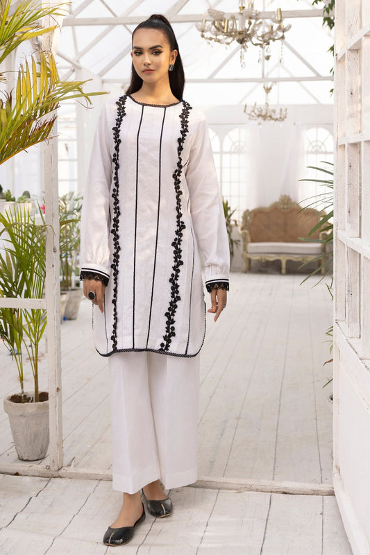 a girl is wearing 2 PC unstitched dobby shirt set with in white color with black design on it