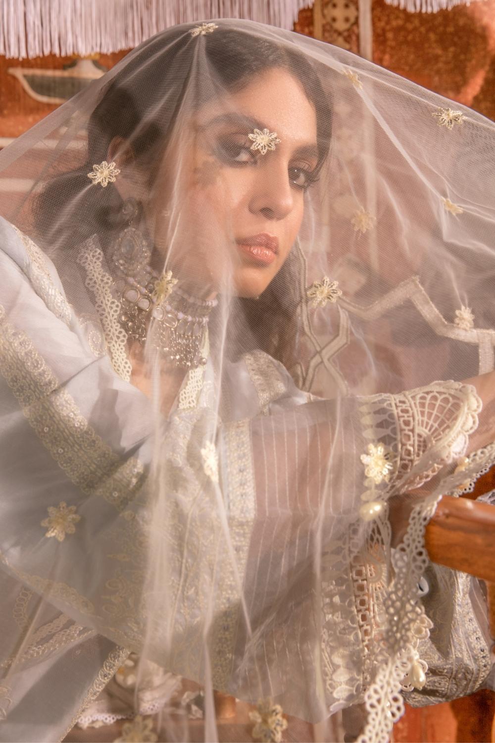 3 PC Unstitched Dyed Embroidered Dobby Shirt + Embroidered Net Dupatta + Dyed Cambric Trouser